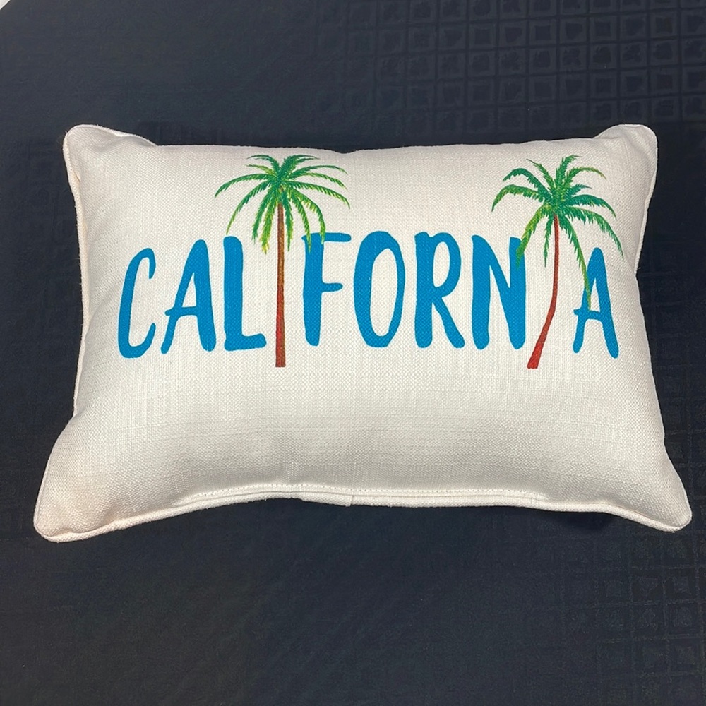 White 'California' Accent Pillow with Blue Lettering and Palm Tree Design